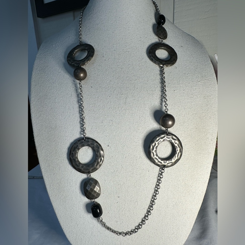 Industrial vibe meets long minimalist gray statement necklace